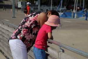 Nanny taking a girl on a day out